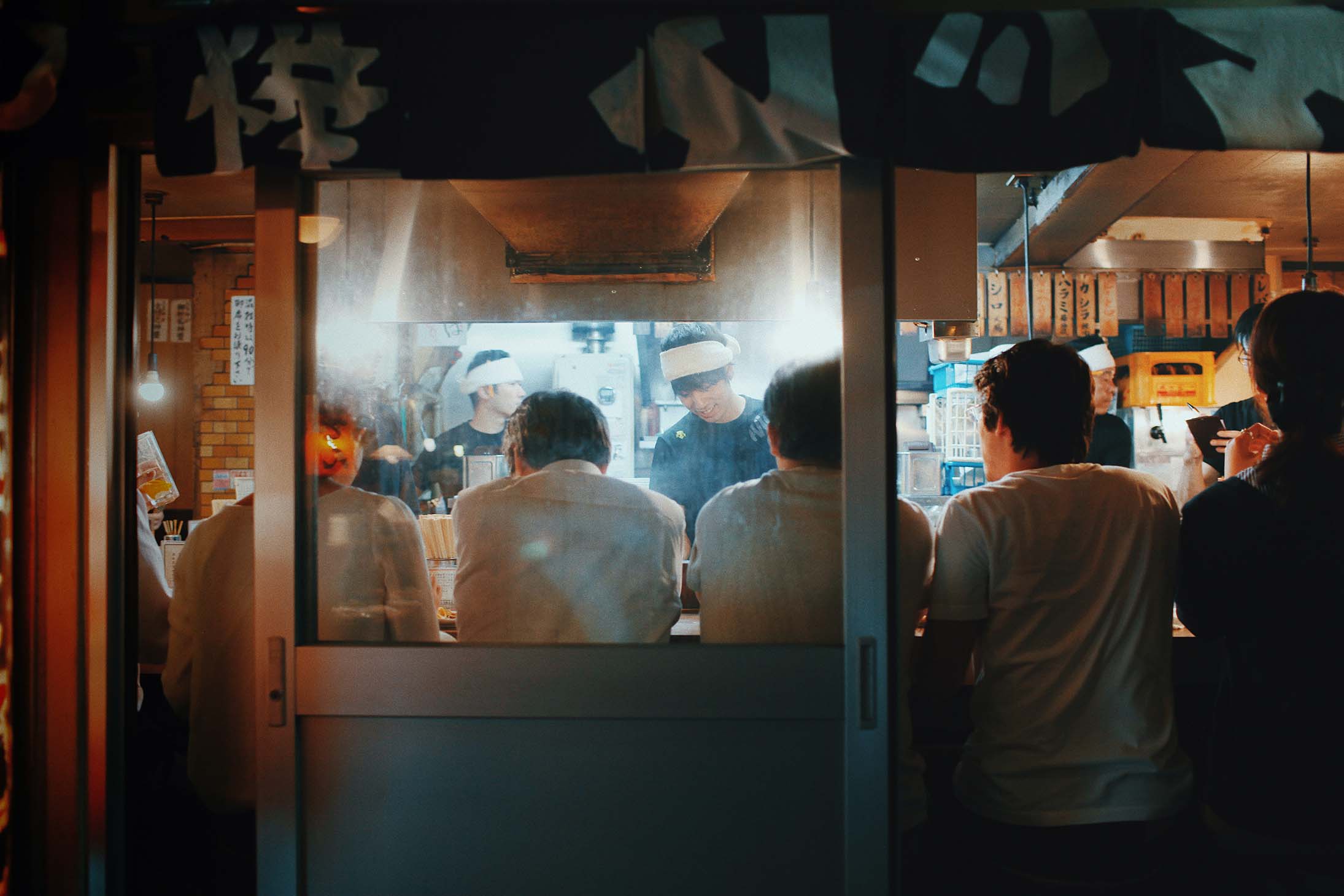 Osaka locals eating at a restaurant.